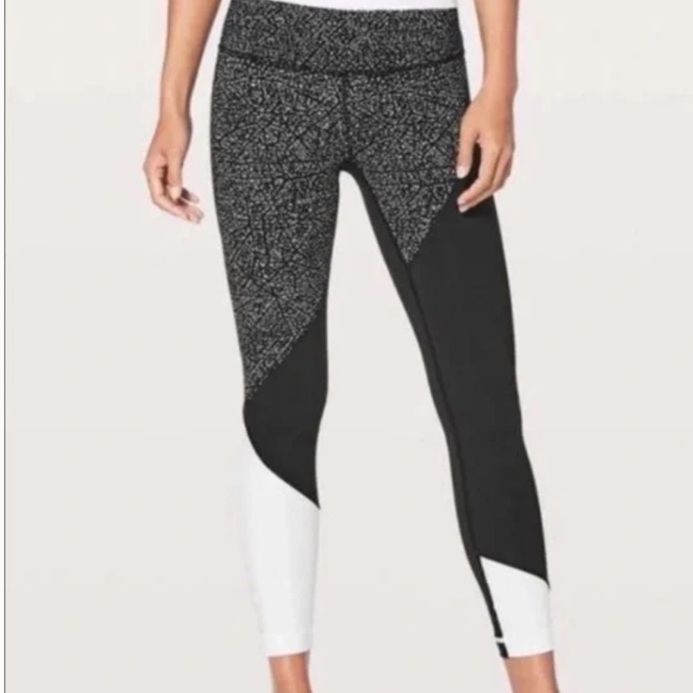 Lululemon Wunder Under polka dot white and black color block leggings.